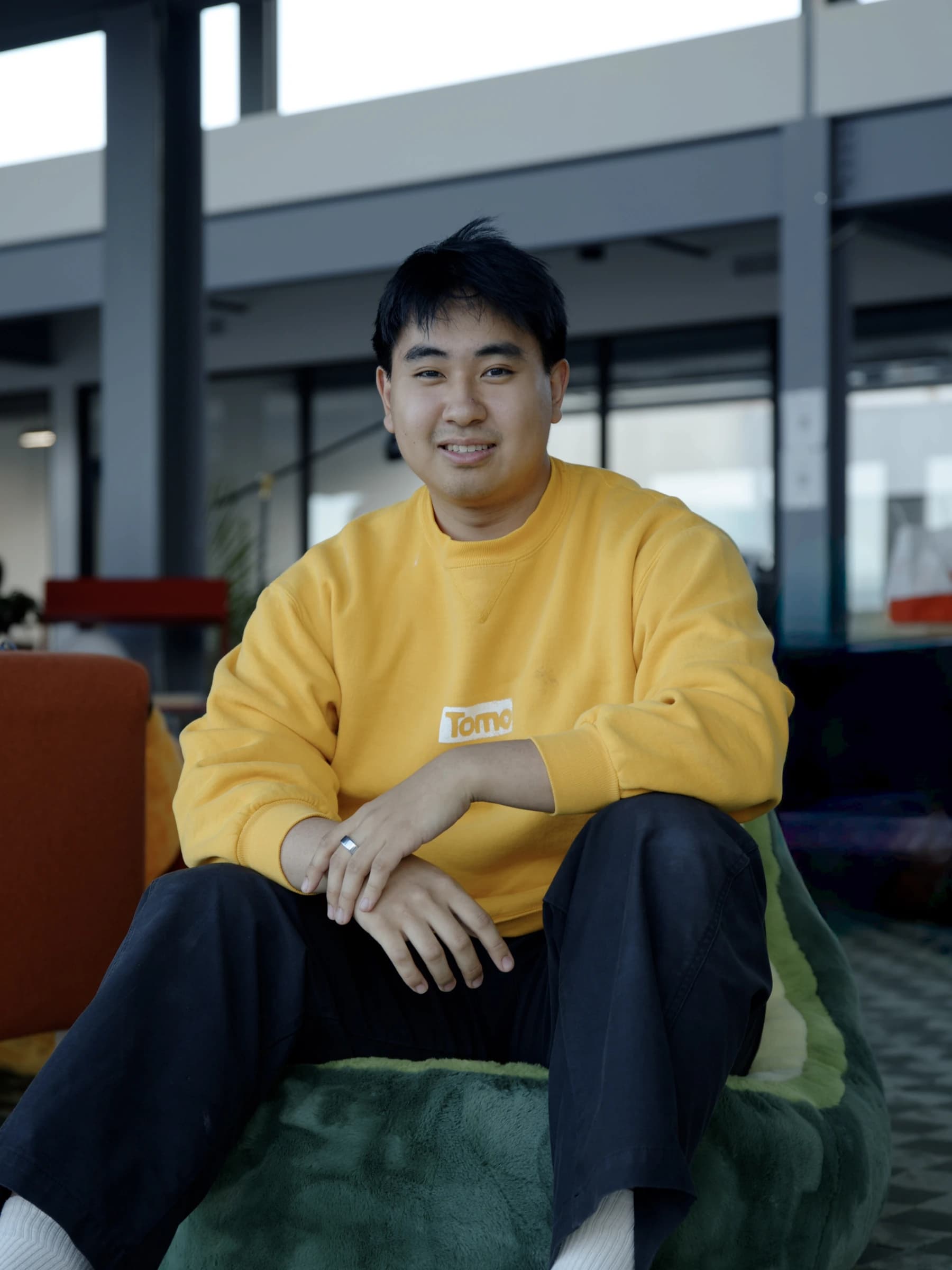 Team member on the avocado beanbag